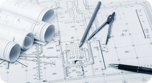 Architectural blueprint with rolled plans, compass, and drawing pens